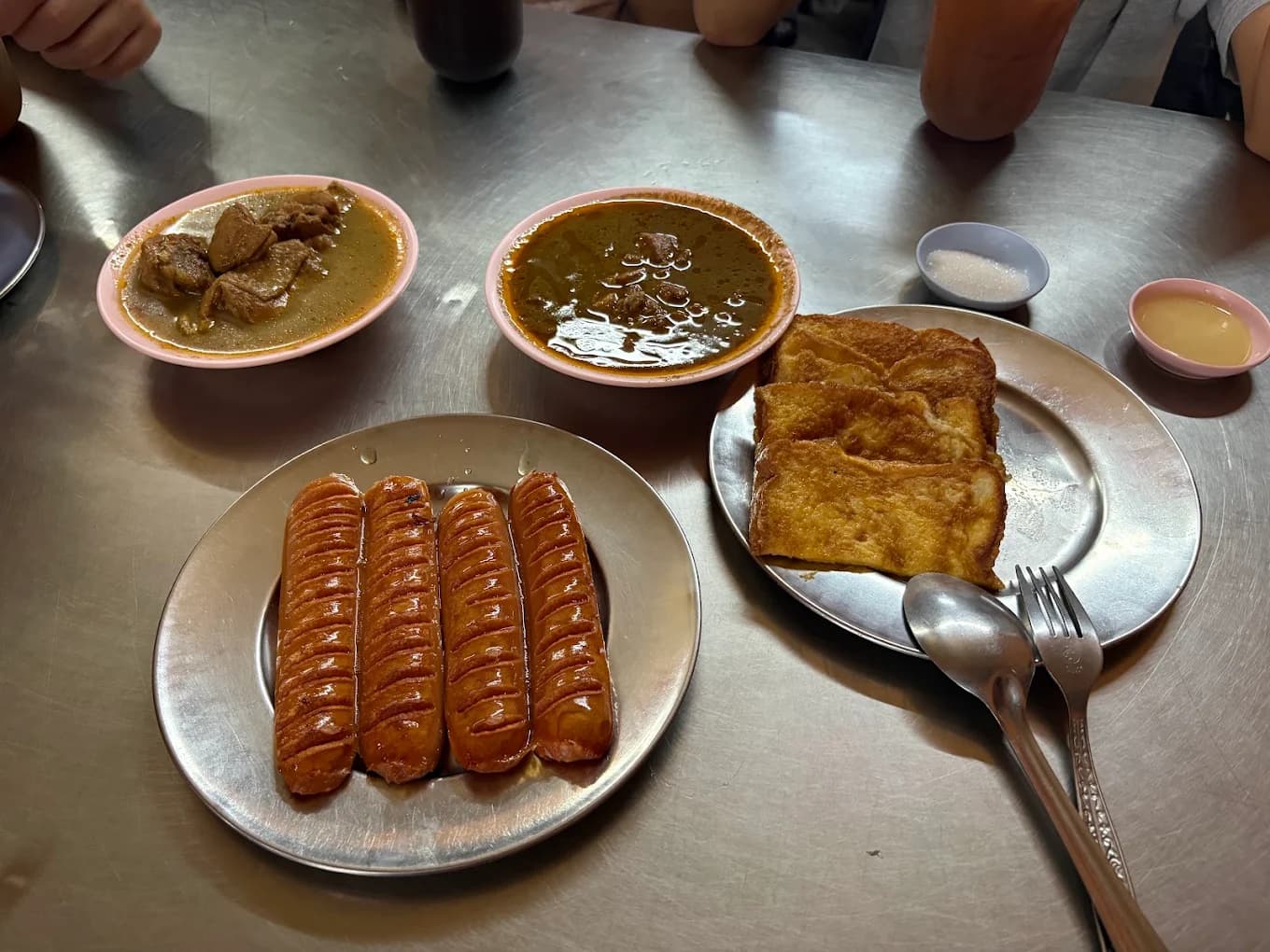 The classic Song-Neung breakfast plate with fried sunny egg and curry