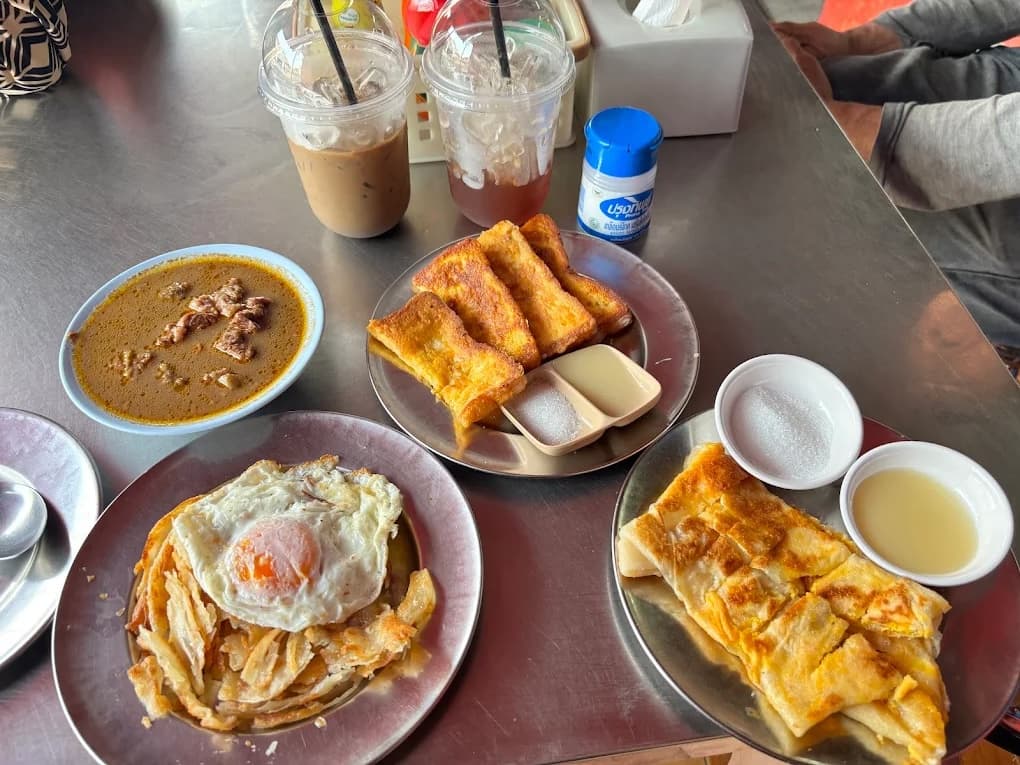 Bustling morning atmosphere at the historic corner shophouse